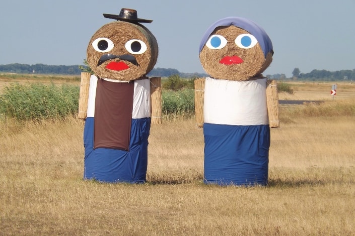A couple created with balls of hay in Hungary